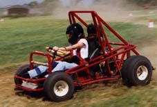 Off-road kart sliding on grass